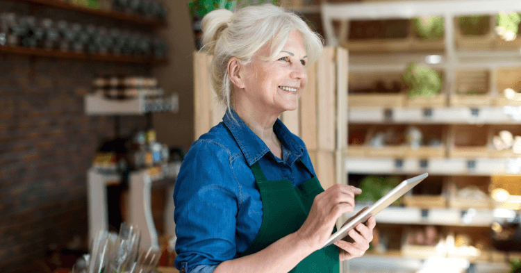 Woman on tablet improving her business operations